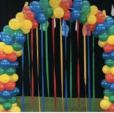 Balloons arch decoration with all colour balloons and ribbons and leaves
