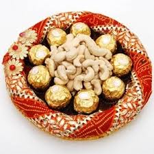 250 gms cashews and 16 ferrero in a tray