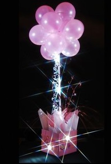 10 Pink sparkle balloons on stick arranged in a box with ribbons