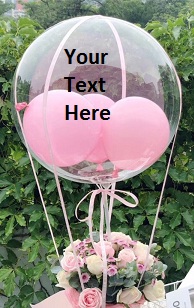 Transparent Balloon Printed WITH YOUR TEXT in 3 words only stuffed with 3 pink balloons Tied with ribbons to a basket of 12 Pink Roses