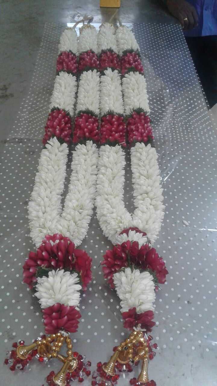 2 bride and groom garlands