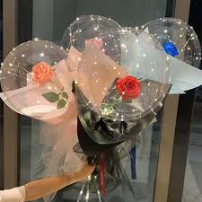 Four Transparent bobo balloons with roses inside and LED Light for Birthday