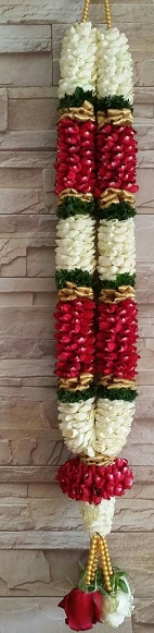 2 garlands with red and white flowers and beads