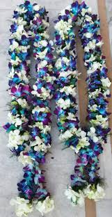 A pair of orchid garlands