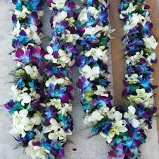 A pair of orchid garlands