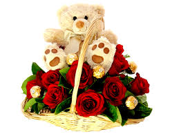 5 ferrero rocher chocolates 8 red roses and teddy all in a basket