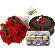 A bouquet of 15 red roses 16 ferrero chocolates and a 1/2 kg cake