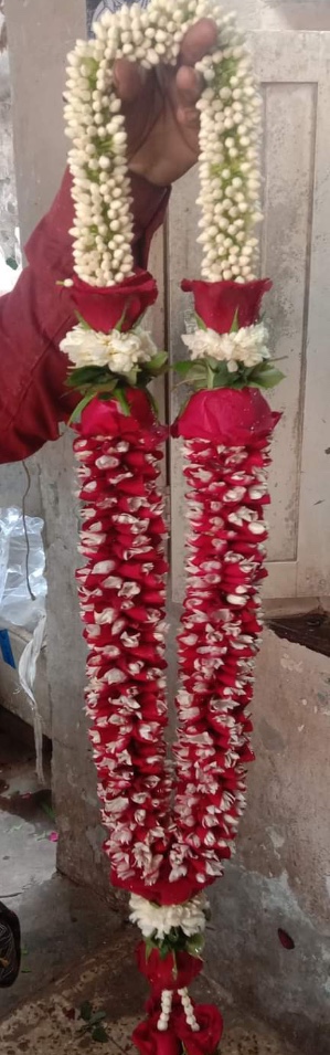 2 garlands with red white flowers and beads