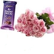 8 pink roses 1 silk bar