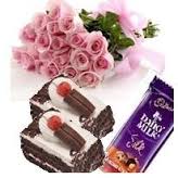 A bouquet of 12 roses with 2 pastries and 1 silk chocolate bar