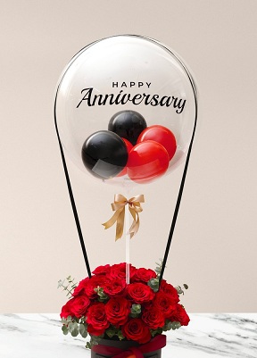 Happy transparent printed transparent balloon with 4 black and red balloons and 20 red roses arrangement Available in Delhi Noida Gurgaon Faridabad Mumbai Chandigarh Mohali Panchkula Dehradun Pune