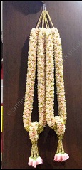 2 garlands with light pink flowers and beads