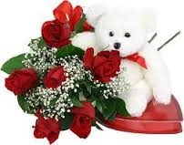 12 Red roses with Heart shaped chocolate box and Teddy (6 Inches)