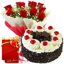 1/2 kg black forest cake and 12 red roses bunch