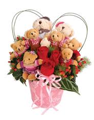 8 Teddies (6 inches each) and 3 red roses in same basket